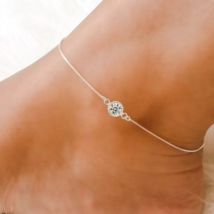 Tornozeleira feminina com zircônia redonda ponto de luz  e banhado a prata 925 e ouro 18k