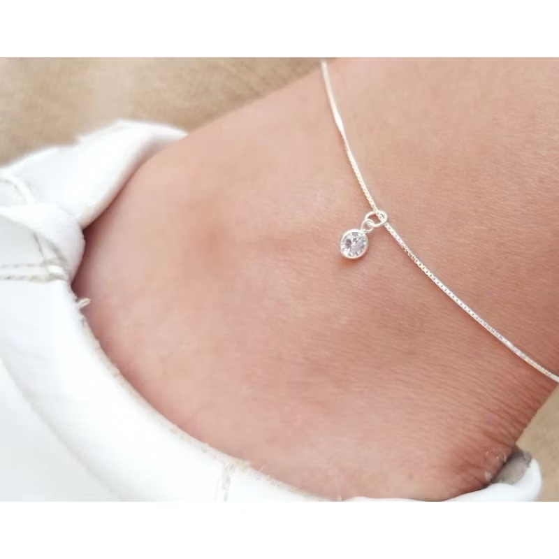 Tornozeleira   feminina ponto de luz  pingente redondo com zircônias banhado a prata 925 ou ouro 18k
