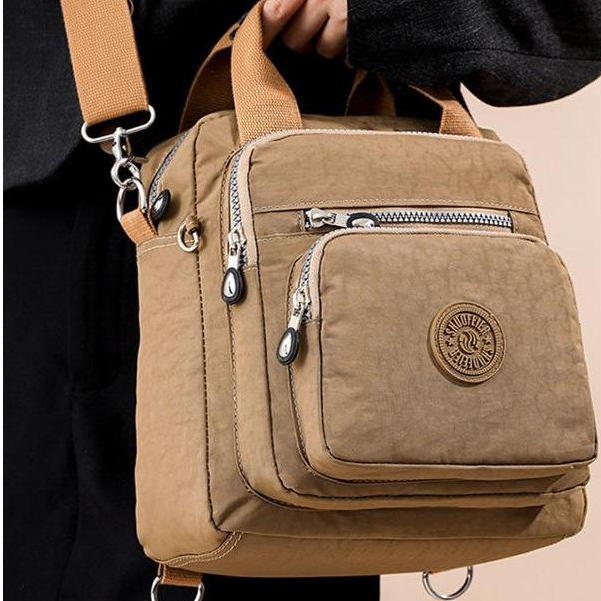 Bolsa Multifuncional em Nylon - Impermeável, Resistente e Estilosa para Viagens e Dia a Dia