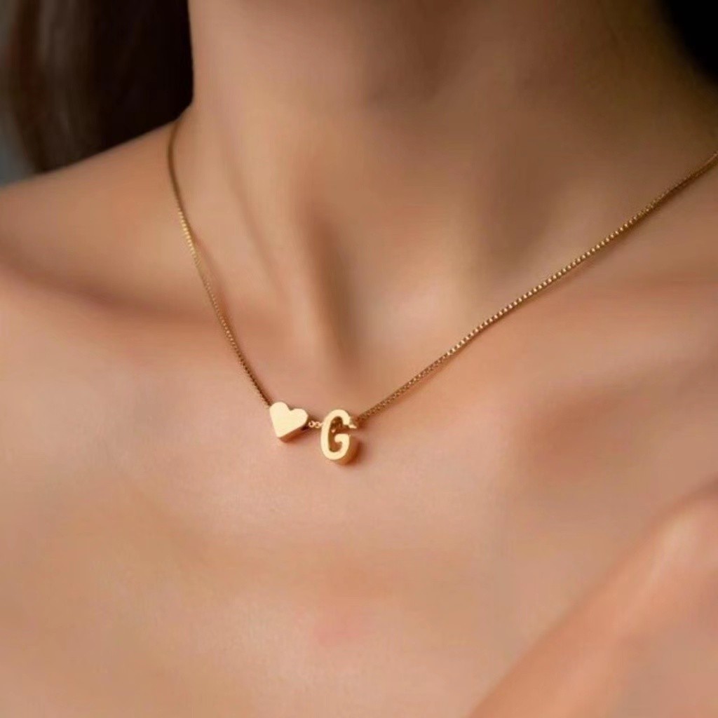 Corrente choker letra pequena e coração banhado a ouro 18K e prata  925