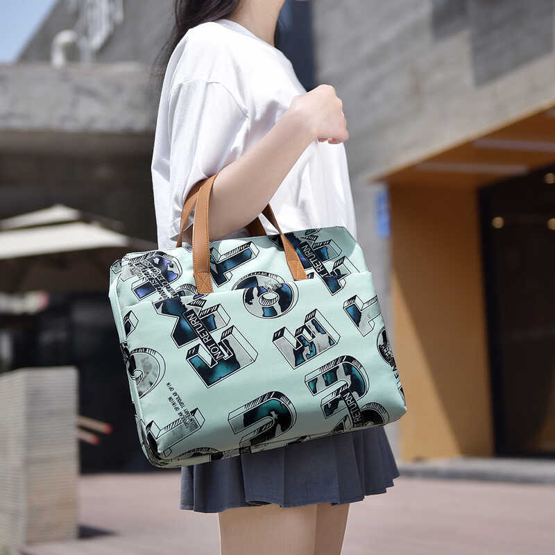 2023 bolsa impressa temperamento feminino All-Match saco Multi-camada choque de grande capacidade